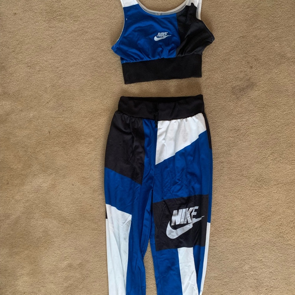 Blue black and white Nike 2 piece, never worn.